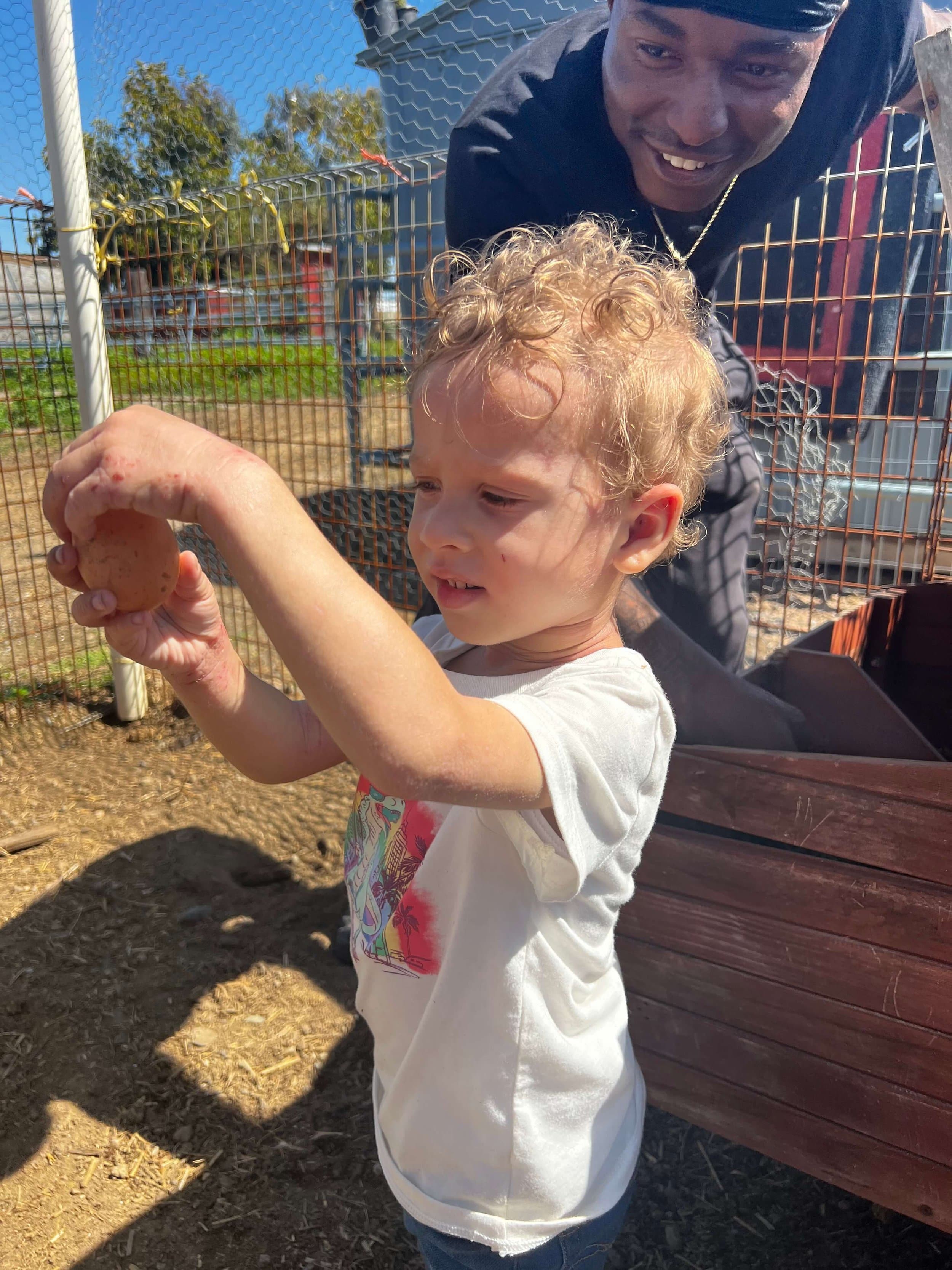 Child learning about nature at Terra Imani